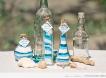 Cómo decorar una botella con arena de colores
